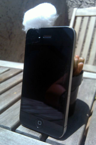 iphone with cotton ball over microphone